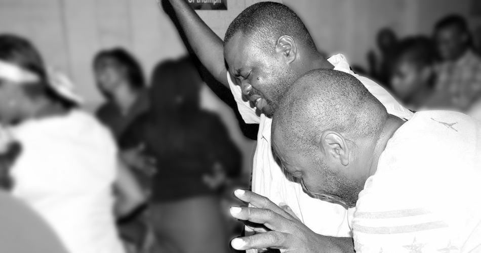 men praying